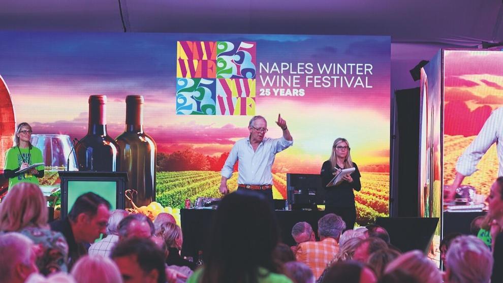 Live auction tent at the 2026 Naples Winter Wine Festival benefiting the Naples Children & Education Foundation.